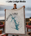 Throw blanket with Falcon Lake map and compass rose design, text "FALCON LAKE TEXAS".