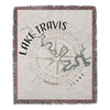 Woven blanket featuring Lake Travis Texas map and compass design.