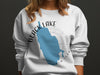 White sweatshirt with a blue map outline that reads "BLACK LAKE NEW YORK".