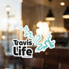 Sticker with "Travis Life" and teal lake outline.