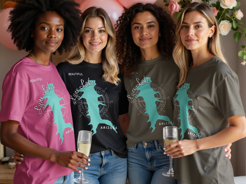 Four women wear t-shirts with "Beautiful Lyuk Lake Arizona" text and compass graphics.