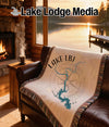 Woven blanket with "Lake LBJ Texas" map design and compass rose.