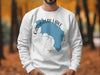 White sweatshirt with blue Garibaldi Lake map and compass graphic.