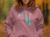 Pink hoodie with "Lake Livingston Texas" text and a turquoise map outline.
