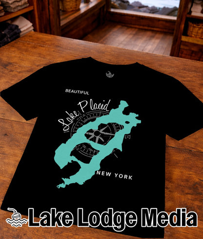 Black t-shirt with a turquoise map of Lake Placid, New York, and compass rose.