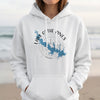 White hoodie featuring a compass graphic with a lake map labeled "Lake O' The Pines Texas".