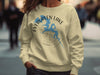 Cream sweatshirt with blue Evergreen Lake Illinois map graphic and compass rose.