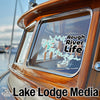Sticker with "Rough River Life" text on a boat window, with "Lake Lodge Media" text below.