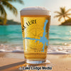 Beer glass with "Lake Lure" text and lake outline on beach background.