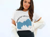 White t-shirt with blue Diamond Valley Lake map graphic and compass rose