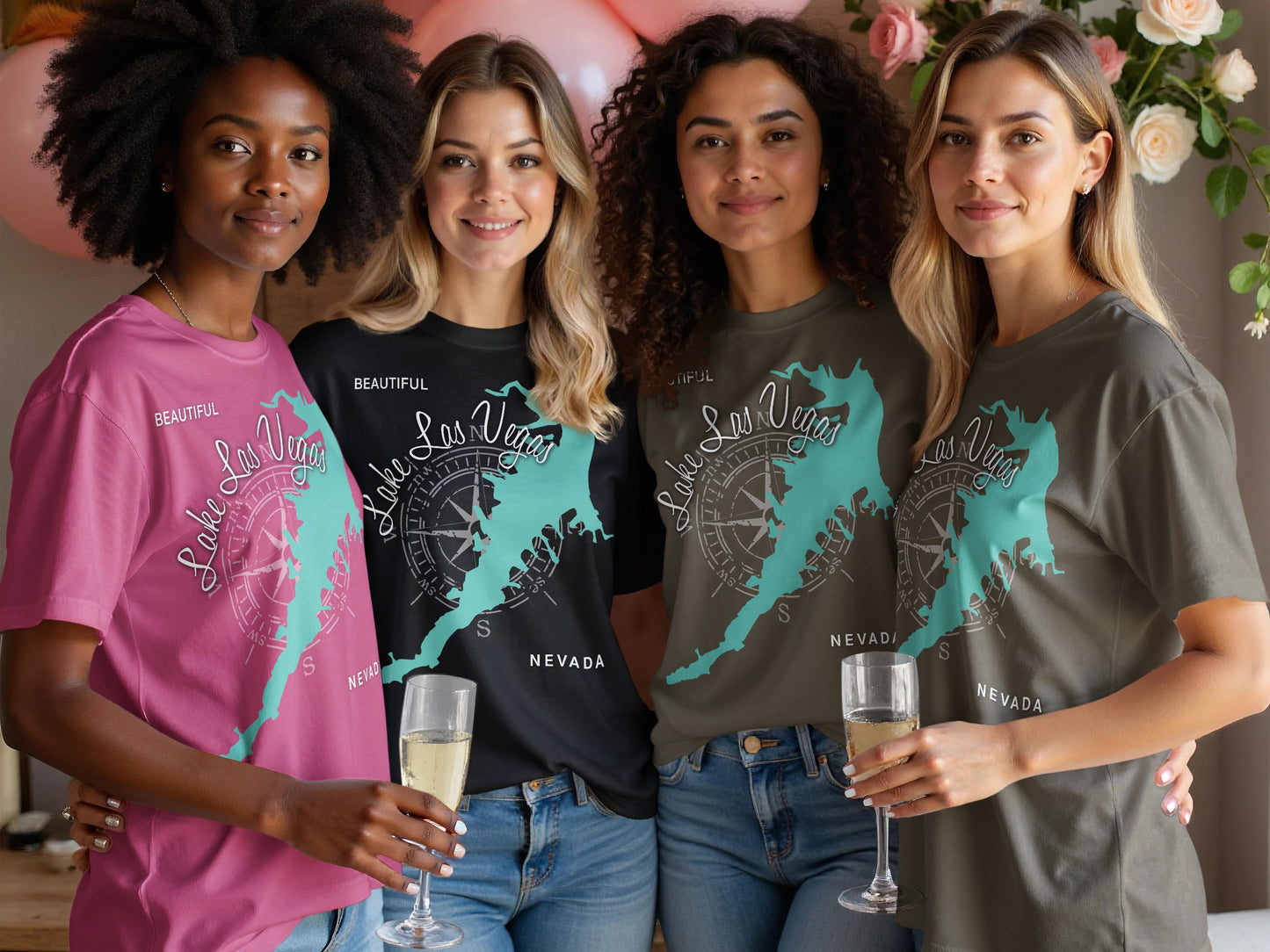 Four women in t-shirts featuring a compass and "Lake Las Vegas Nevada" design.