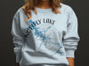 Light blue sweatshirt with a compass rose and map of V.L. Nottaway Lake, Georgia design.