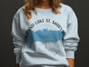 Light blue sweatshirt with "Grand Lake St. Marys Ohio" and compass design.