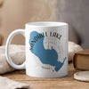 White mug with Sandhill Lake Wisconsin map design and compass rose graphic.