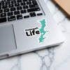Oologah Life sticker on a laptop keyboard with marble background.