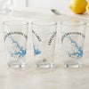 Three clear glasses display a compass rose and Smith Mountain Lake map in blue.