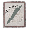 Green Bay Wisconsin map design on a woven blanket with compass graphic.