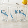 Three clear glasses each feature a blue map of Bass Lake, California, with compass rose detail.