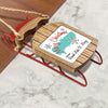 Wooden Christmas ornament shaped like a red sled with "Merry Christmas" and "FROM Grand Lake St. Marys" text.