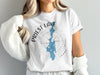 White t-shirt with Priest Lake Idaho graphic and compass design.