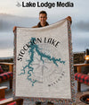 Stockton Lake Missouri map design on a fringed throw blanket held by a man.