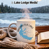 White mug with Arkabutla Lake map and compass, steam rising, by a window.
