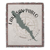 Lake San Pablo map on a woven blanket with a compass rose and fringed edges.
