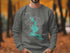 Sweatshirt with Mooselookmeguntic Lake map and compass rose graphic.