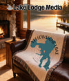 Woven blanket with Yellowstone Lake map design and "Wyoming" text.