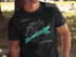 Black t-shirt with "Beautiful Huntington Lake" and compass design.