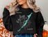 Black sweatshirt with "Beautiful Largo Key Florida" map and compass rose design.