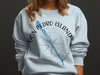 Light blue sweatshirt with "DON PEDRO ISLAND FLORIDA" and compass graphic.