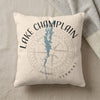 Cream pillow with Lake Champlain map, compass, and "Vermont" text.
