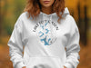 White hoodie with "Lake Fort Gibson Oklahoma" text and a blue map graphic.