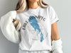 White t-shirt with Lake Winnipeg map and compass design, "Lake Winnipeg Manitoba" text.
