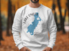White sweatshirt with Lake Onota map and compass design, Massachusetts.