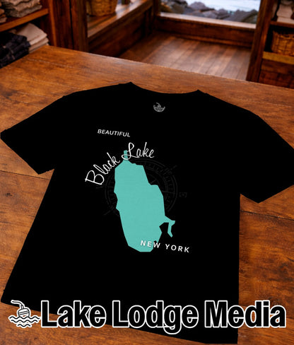 Black Lake New York graphic on a black t-shirt with Lake Lodge Media logo.