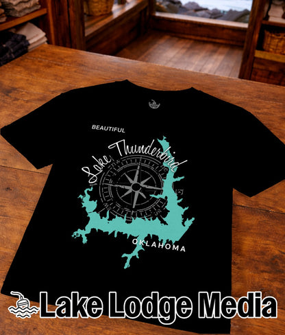 Black t-shirt with turquoise lake outline and "Lake Thunderbird OKLAHOMA" text.
