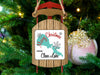 Sled ornament with "Merry Christmas from Clear Lake" text and a teal map graphic.