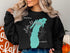 Black sweatshirt with "Lake Michigan Illinois" text and compass rose.