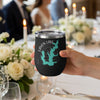 Black tumbler with Lavon Lake map and compass design held in hand.