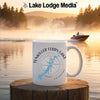 White mug with Tenkiller Ferry Lake design on a lake at sunrise.