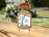 Ornament shaped like a red and brown sled with "Merry Christmas From Yale Lake" text.