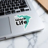 Turquoise map sticker with "Waco Life" text on a laptop.