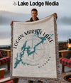Man holding a throw blanket with a map of Logan Martin Lake, Alabama.