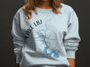 Light blue sweatshirt with a Lake LBJ Texas map and compass graphic.