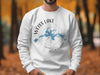 White sweatshirt with Weiss Lake Alabama map and compass graphic.