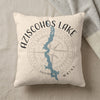 Aziscos Lake Maine map design on a cream textured pillow with compass rose graphic.