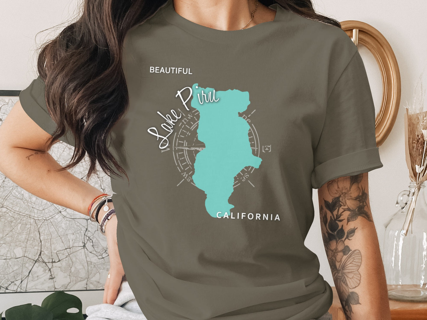 T-shirt featuring a teal map outline of Lake Piru, California.