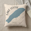 Cream pillow with blue Lake Louise map graphic and compass rose.